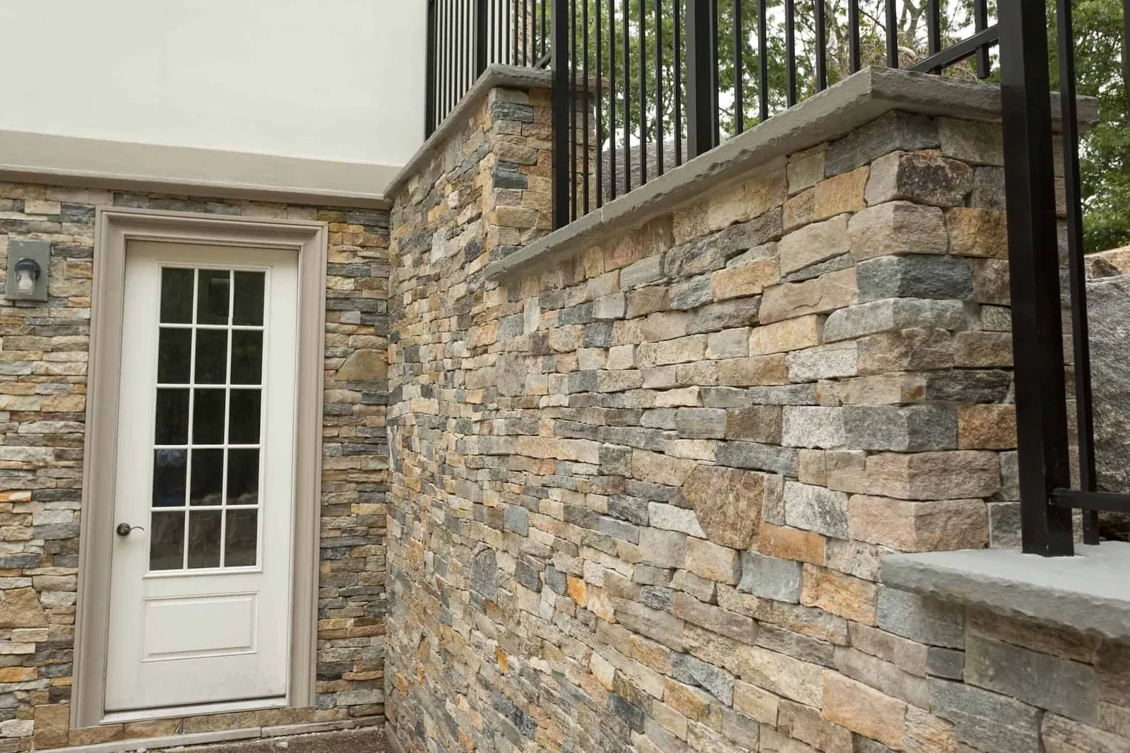 Stone veneer exterior wall